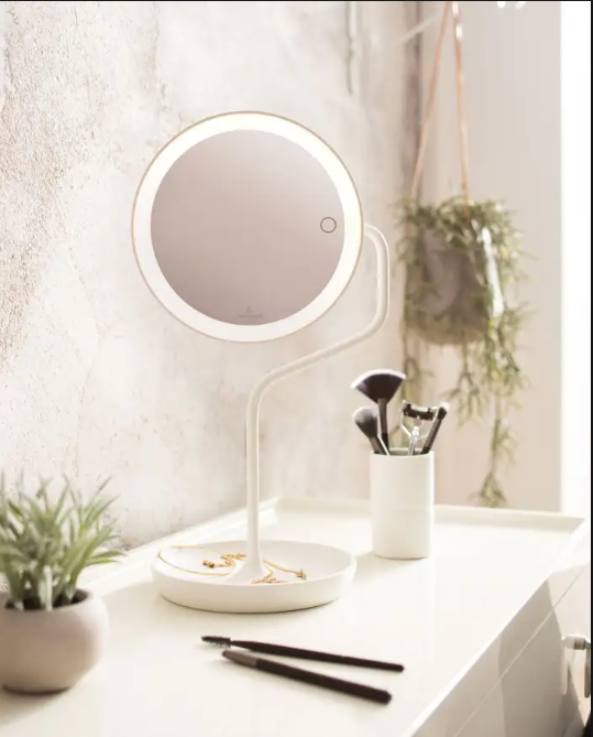 standing lamp beside single gray chair