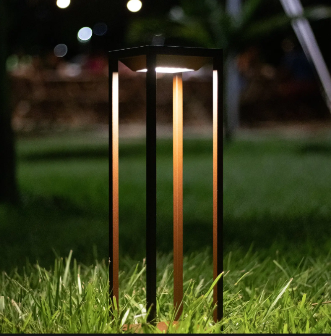 standing lamp beside single gray chair